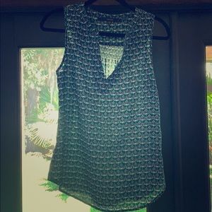 Green sleeveless blouse by fun2fun, size small